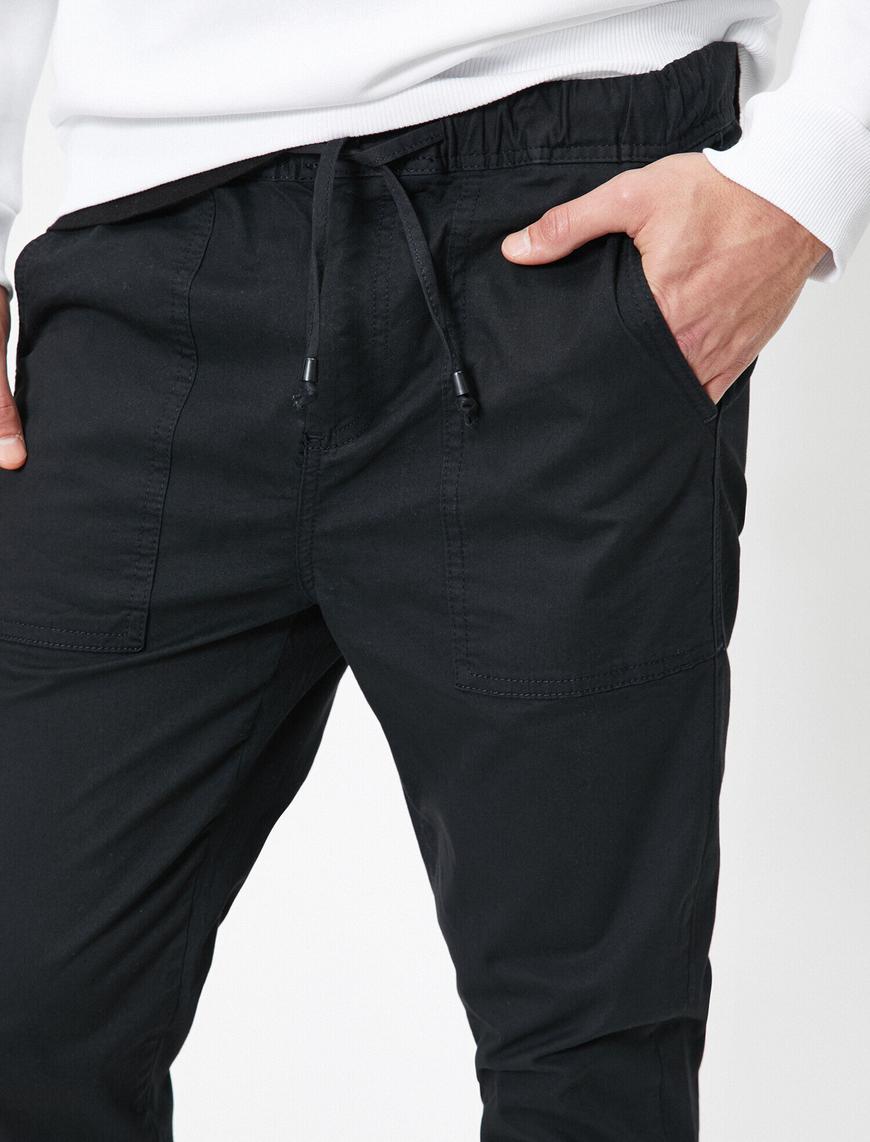   Beli Bağlamalı Ve Lastikli Cep Dikişli Paçası Lastikli Rahat Kesim Pantolon