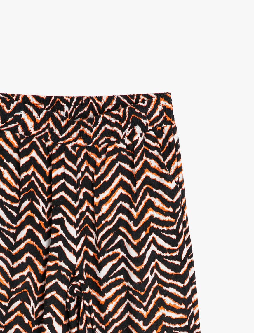 Kız Çocuk Zebra Desenli Dökümlü Kumaştan Beli Lastikli Bol Harem Pantolon