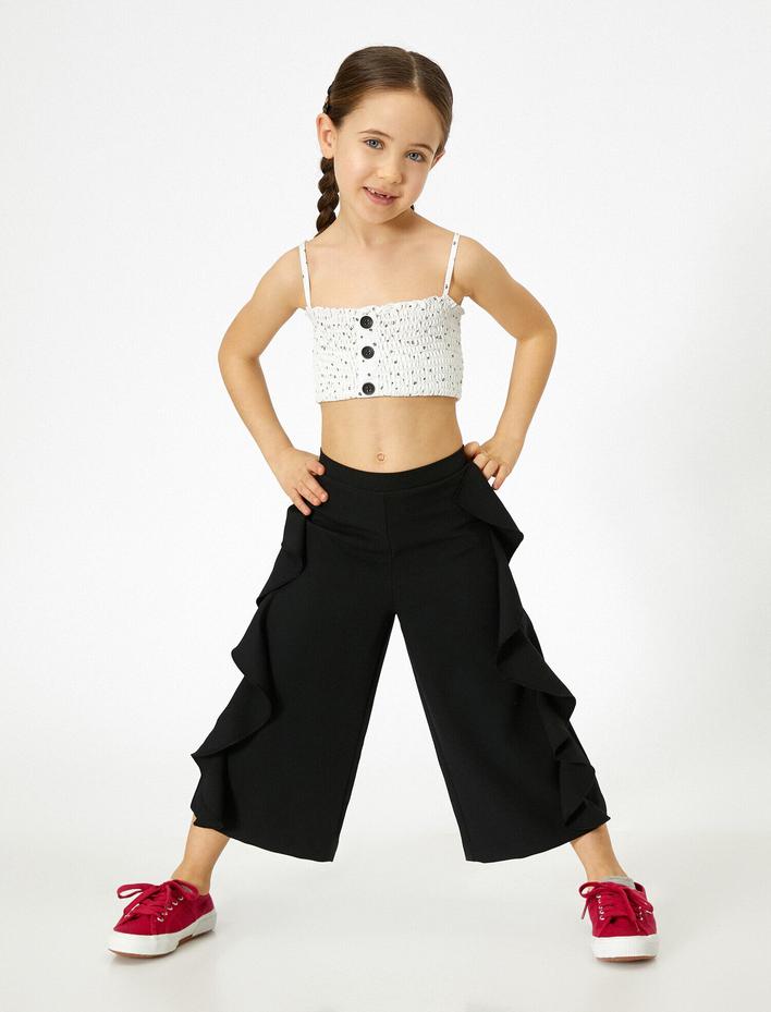 Kız Çocuk Dökümlü Kumaştan Beli Lastikli Yanları Fırfırlı Normal Bel Kısa Pantolon