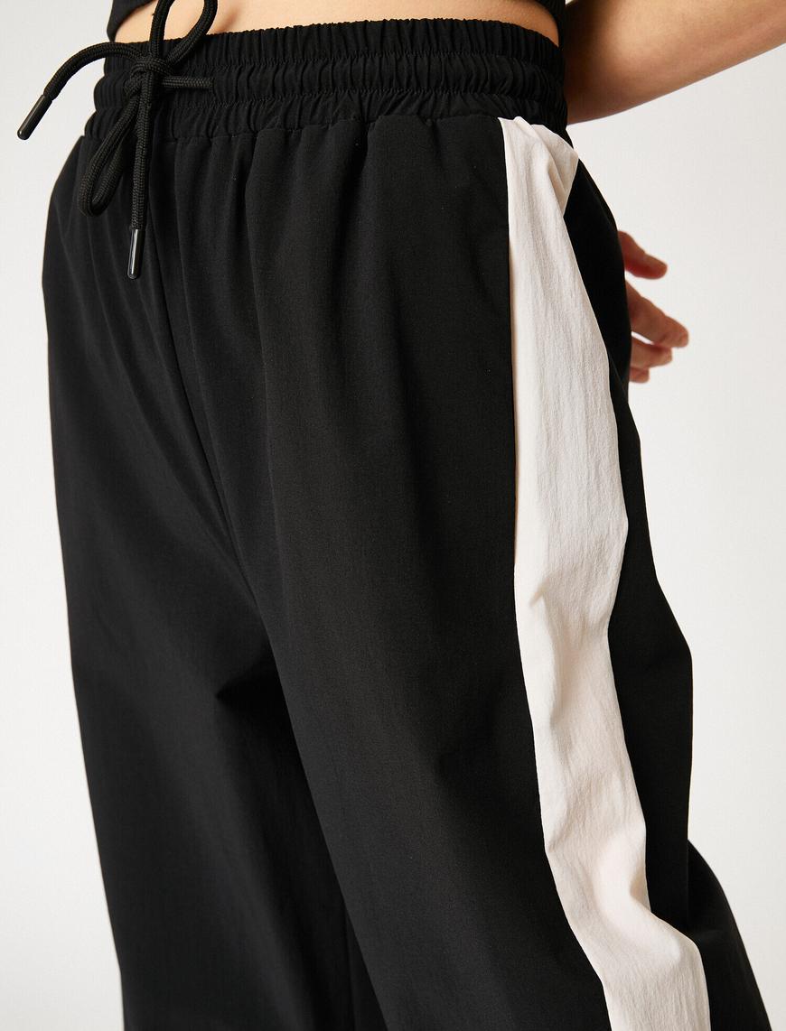   Beli Lastikli Çizgili Jogger Pantolon