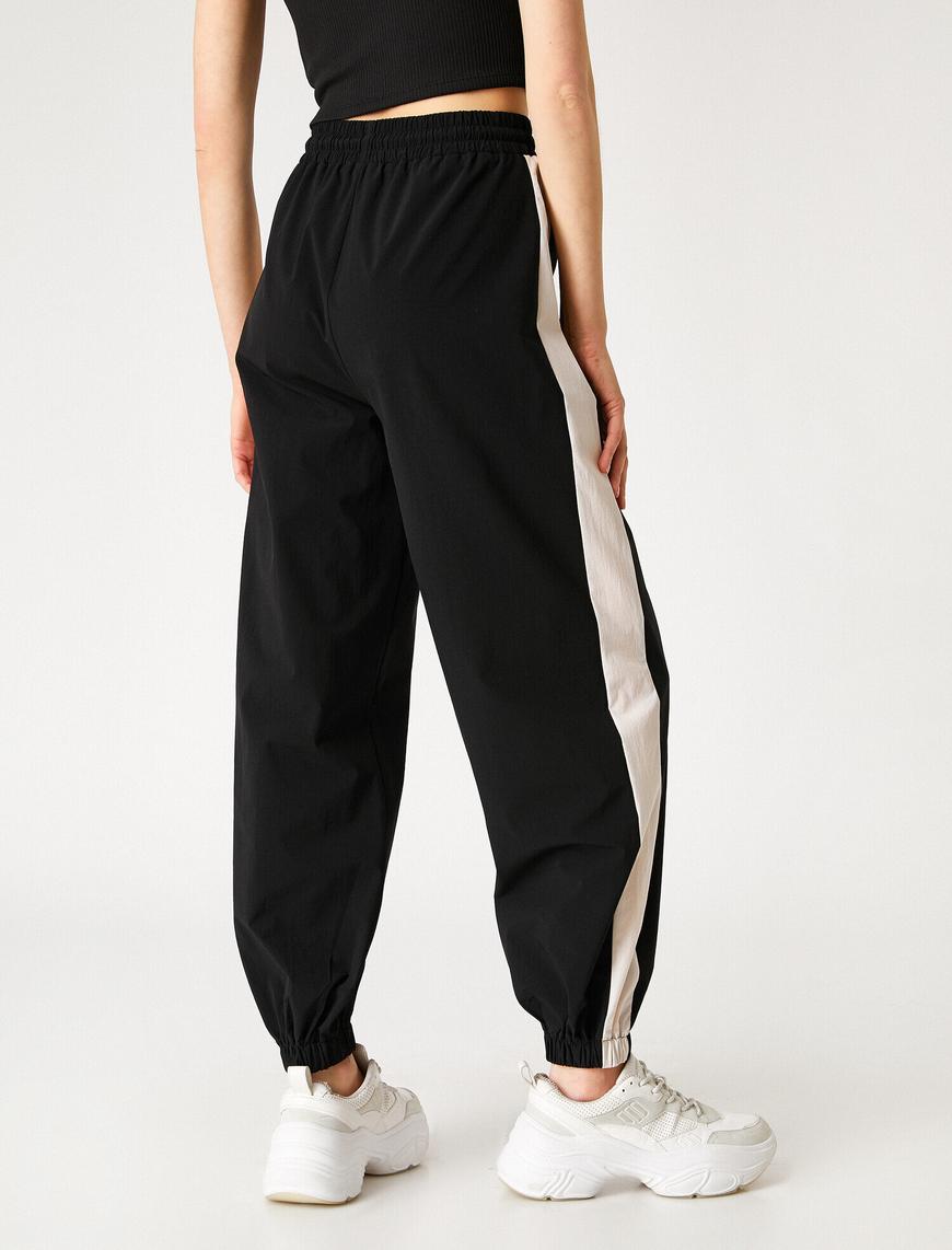   Beli Lastikli Çizgili Jogger Pantolon