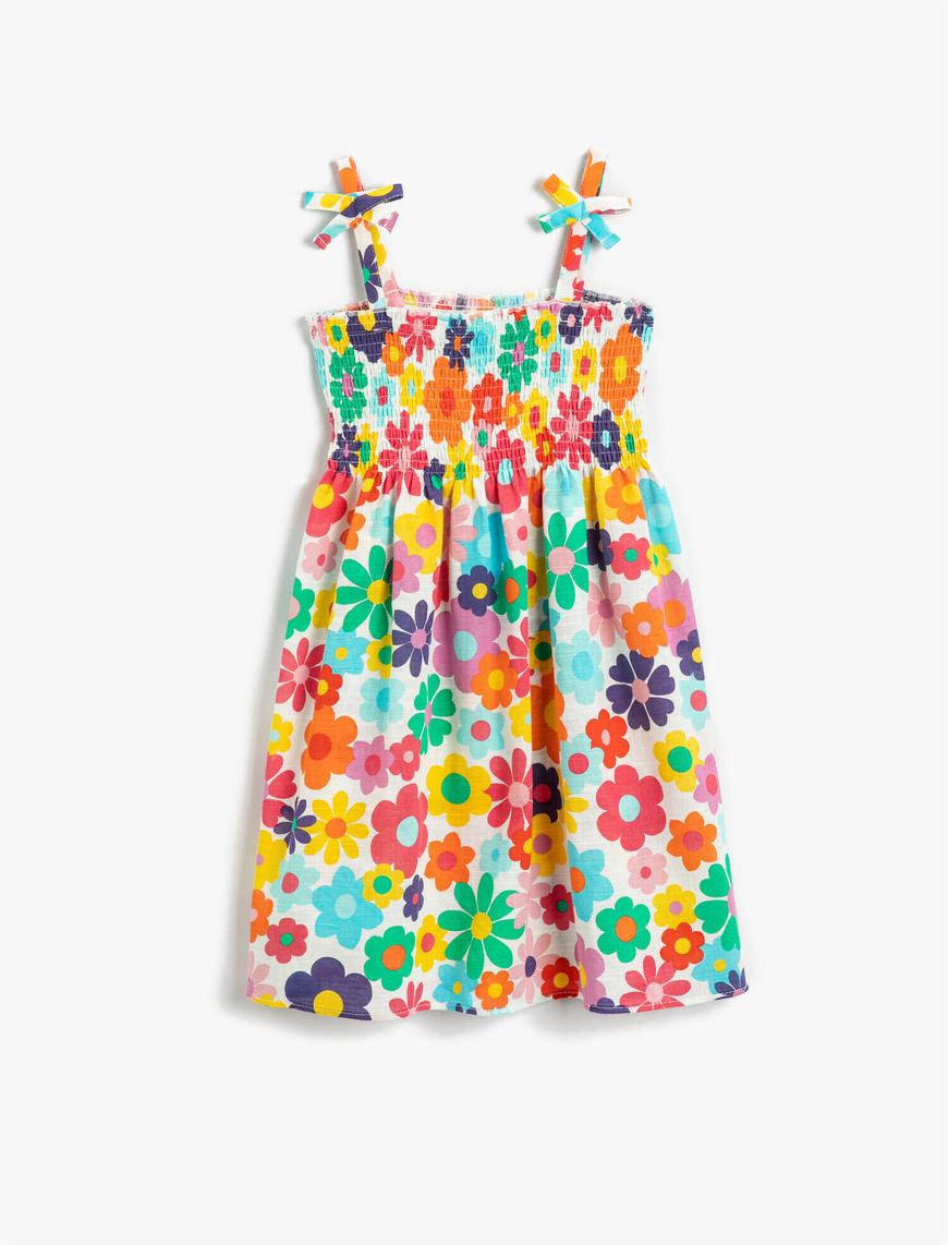  Kız Çocuk Elbise İnce Askılı Fiyonk Detaylı Lastikli Çiçek Baskılı Midi Pamuklu