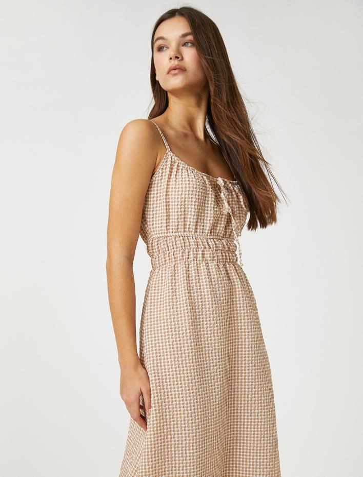  Uzun Elbise Pötikareli İnce Askılı Beli Gipeli Fiyonk Detaylı