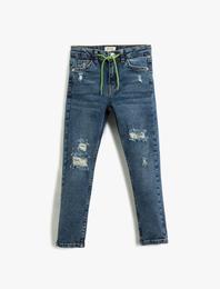 Dar Paça Beli Bağlamalı Yıpratılmış Kot Pantolon - Skinny Jean