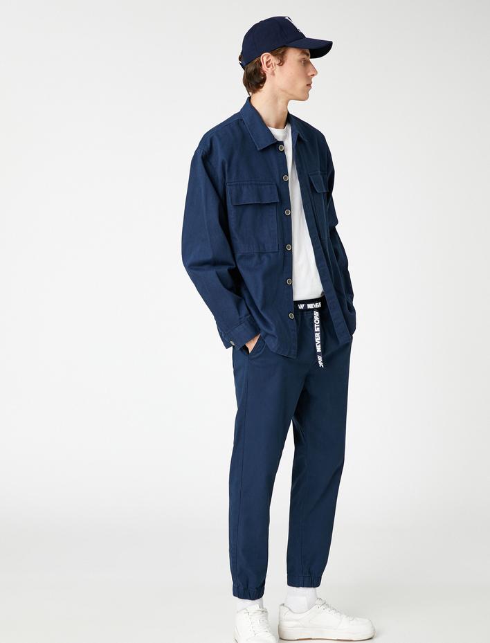  Beli Lastikli Pantolon Slogan Baskılı Kemer Detaylı Cepli