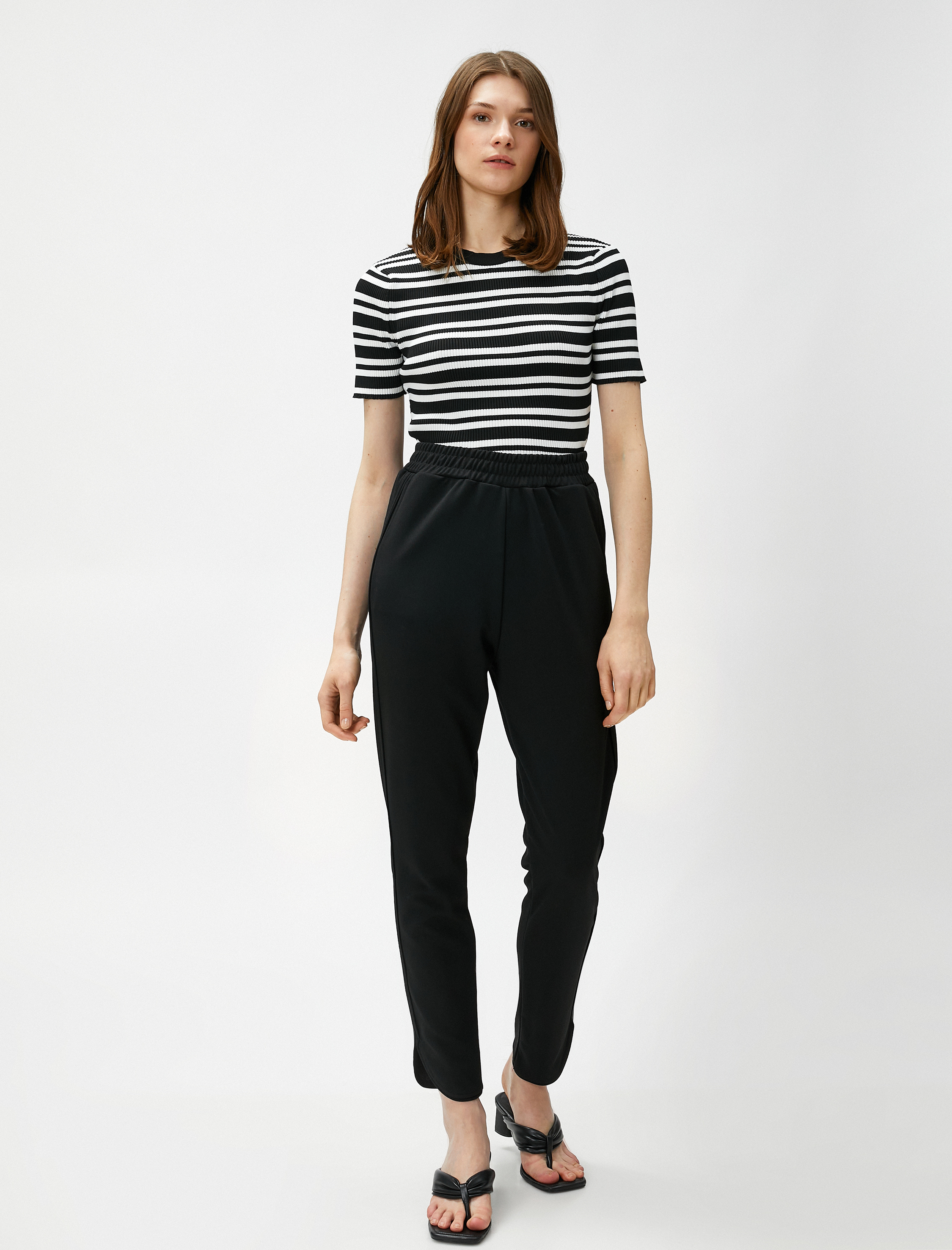   Beli Lastikli Pantolon Dar Paça Yırtmaçlı