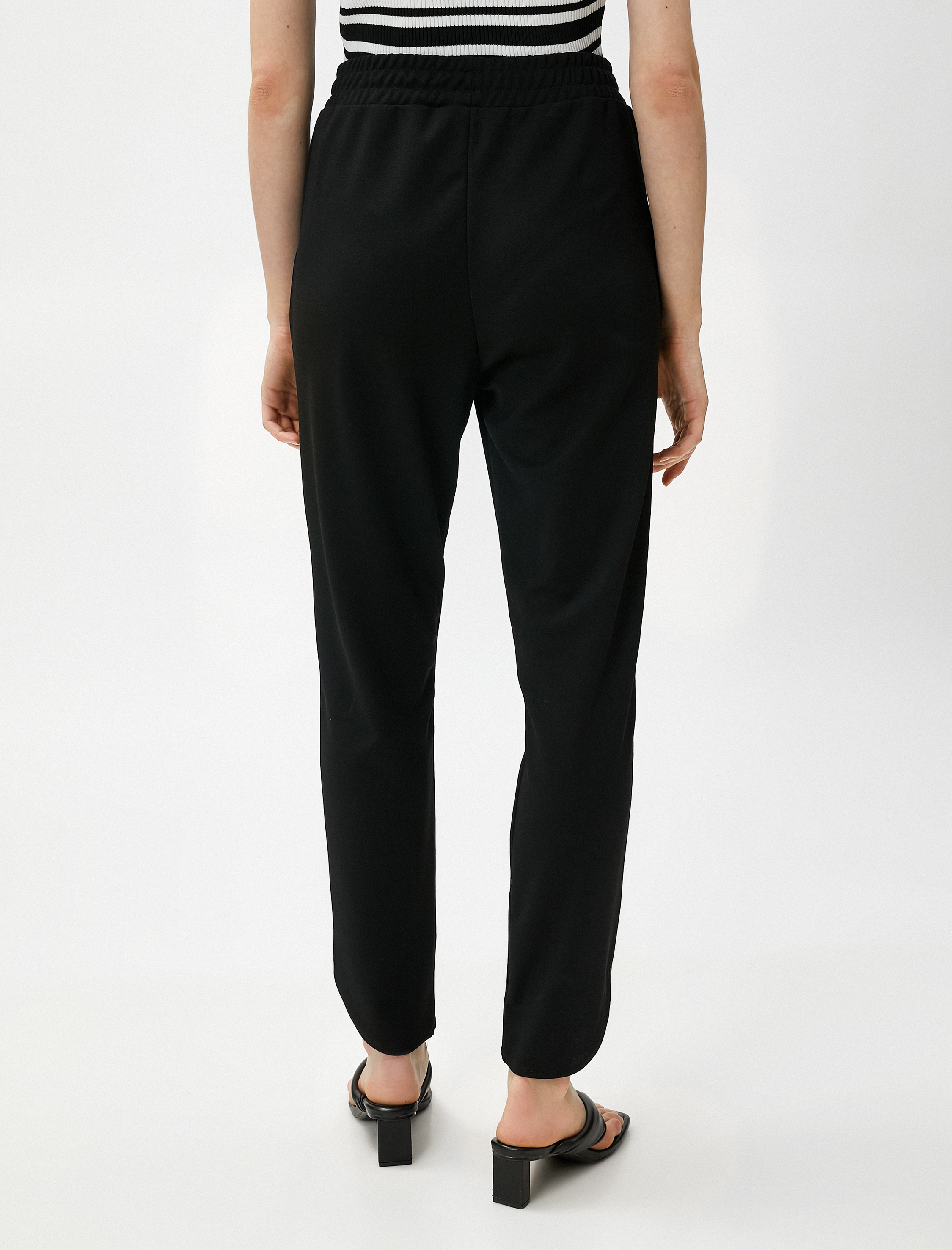   Beli Lastikli Pantolon Dar Paça Yırtmaçlı