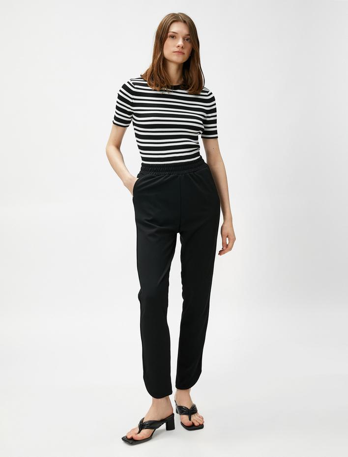  Beli Lastikli Pantolon Dar Paça Yırtmaçlı