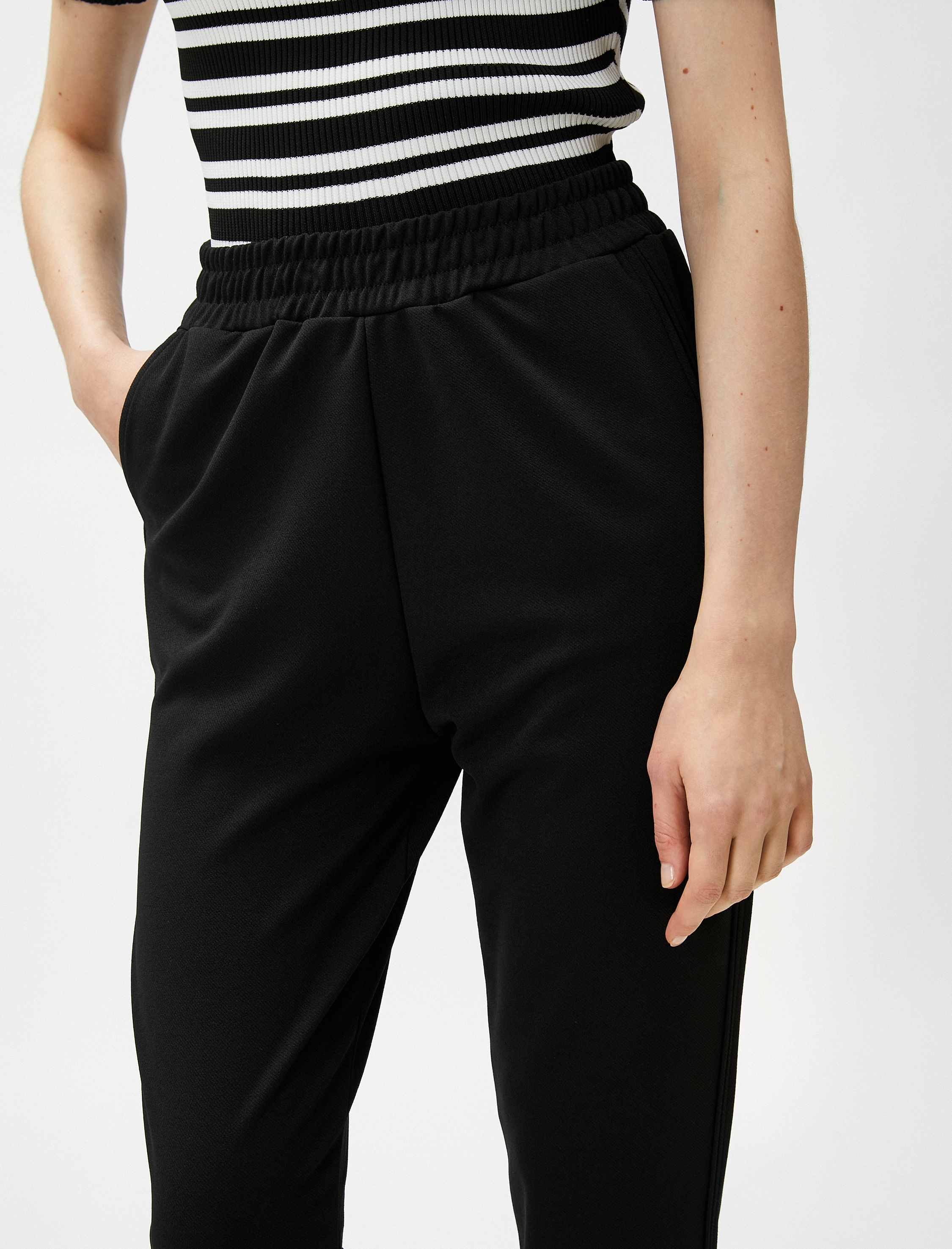   Beli Lastikli Pantolon Dar Paça Yırtmaçlı