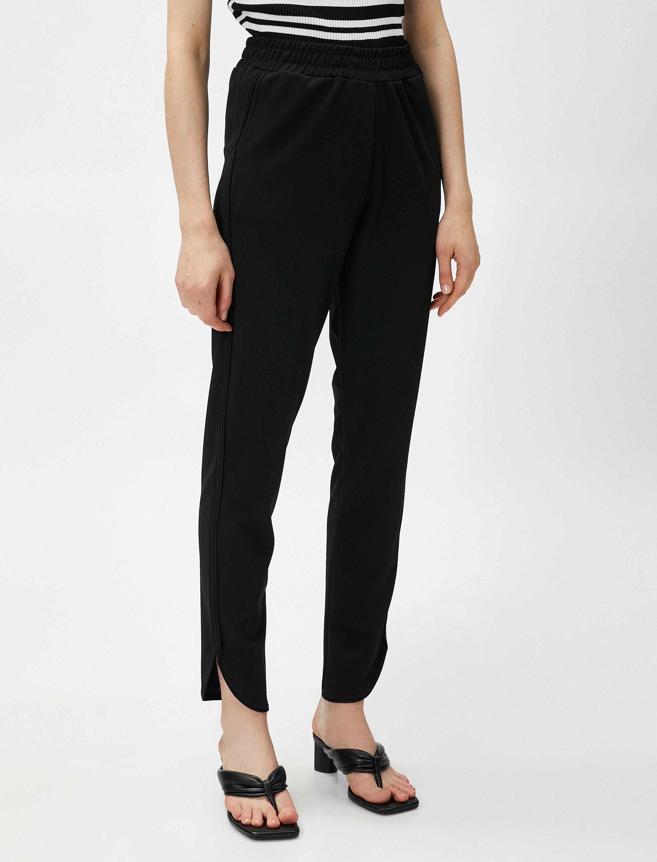   Beli Lastikli Pantolon Dar Paça Yırtmaçlı