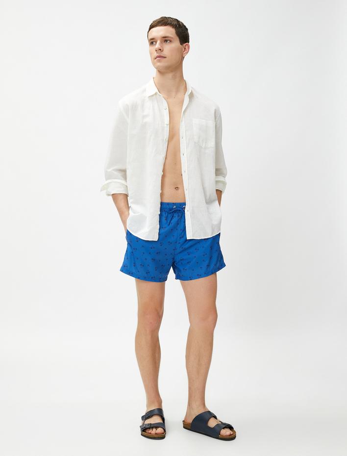  Deniz Şortu Palmiye Baskılı Beli Bağcıklı Cepli