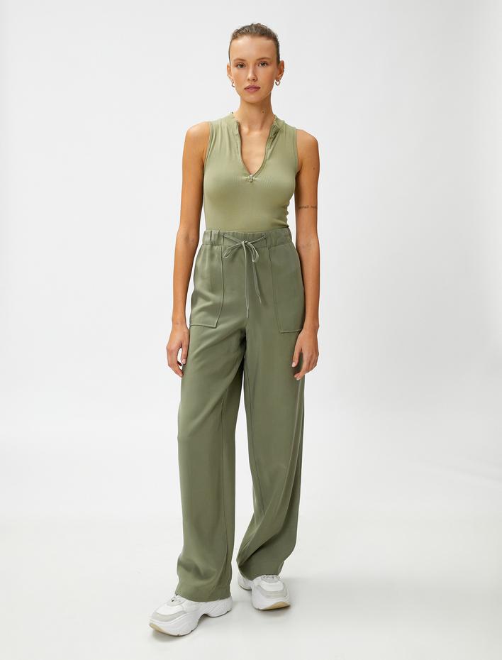  İpeksi Dokulu Rahat Pantolon Beli Bağlamalı Cepli