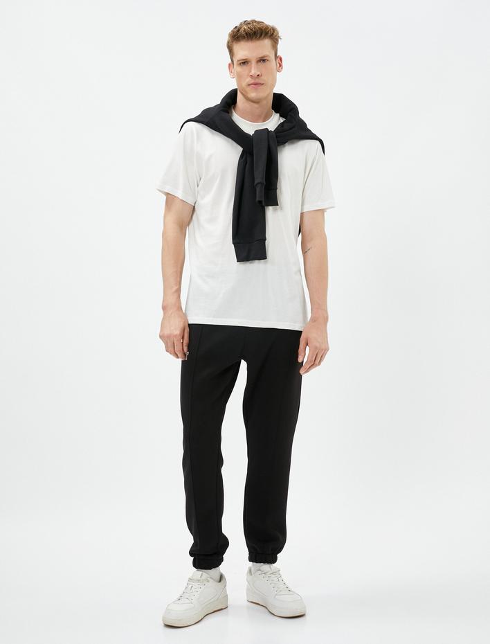  Jogger Eşofman Altı Dikiş Detaylı Slogan Baskılı Beli Bağcıklı Şardonlu