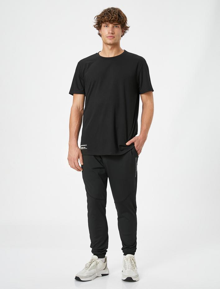  Jogger Eşofman Altı Slogan Baskılı Beli Bağcıklı Cepli