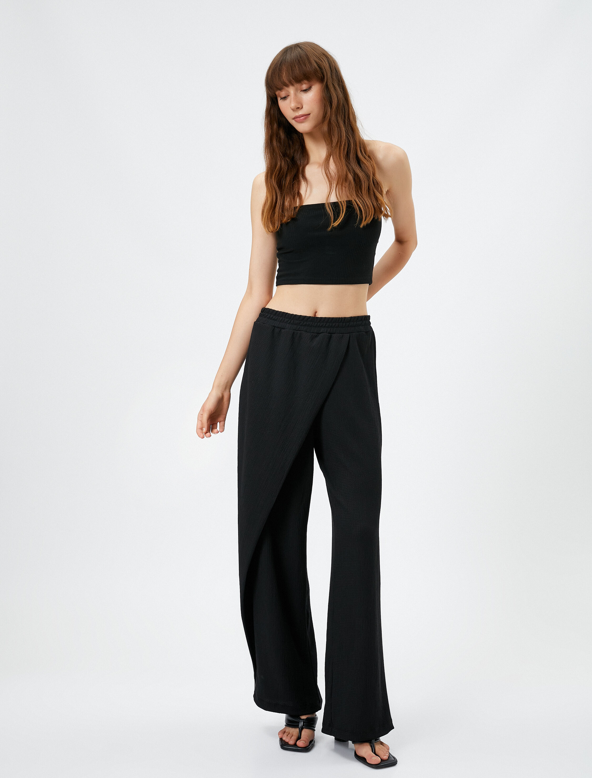   Bol Paça Pantolon Beli Lastikli Asimetrik Kesim Dokulu