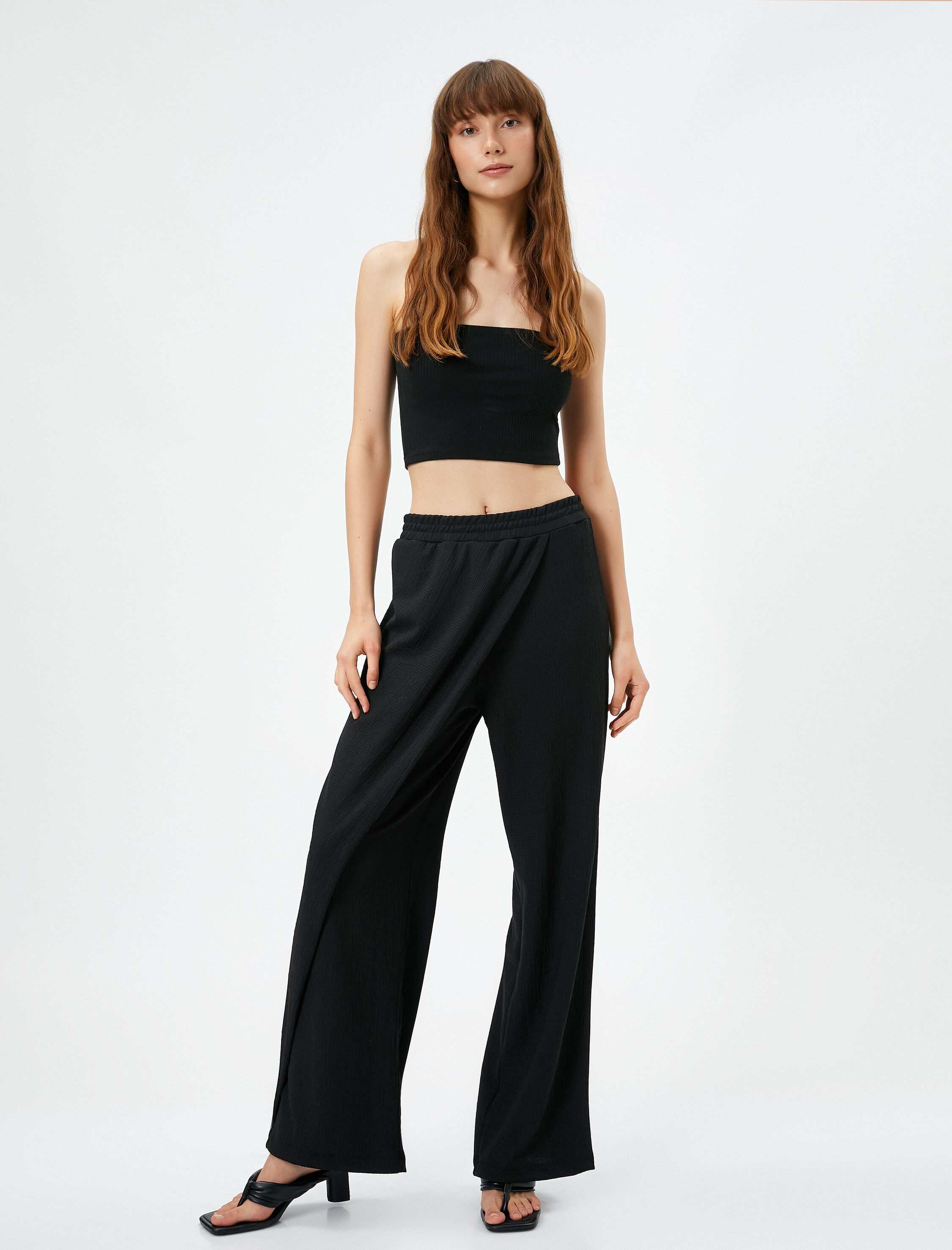   Bol Paça Pantolon Beli Lastikli Asimetrik Kesim Dokulu