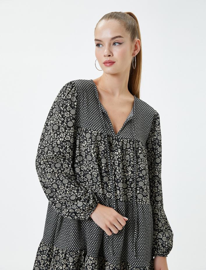  Çiçekli Mini Balon Kol Elbise Uzun Kollu V Yaka Bağlamalı Rahat Kesim Katlı Bürümcük