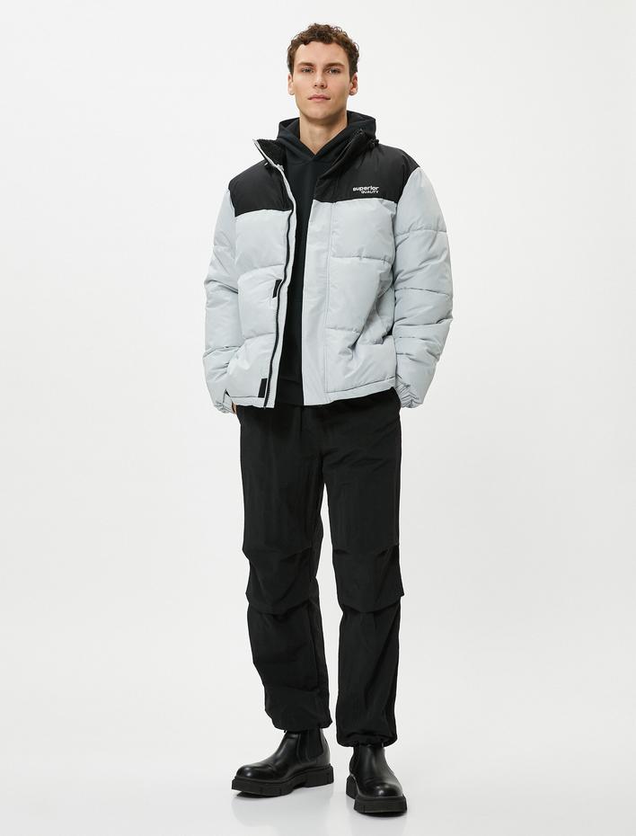  Şişme Mont Dik Yaka Renk Bloklu Fermuarlı Cep Detaylı