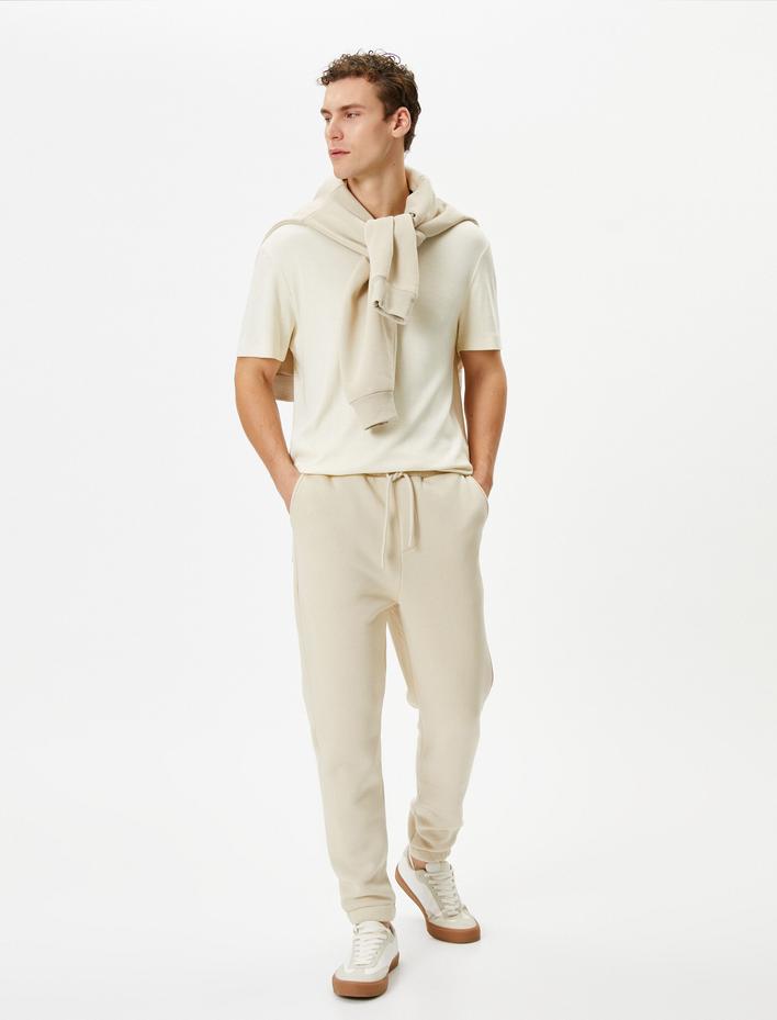  Jogger Eşofman Altı Slogan Baskılı Beli Bağcıklı Cepli Şardonlu