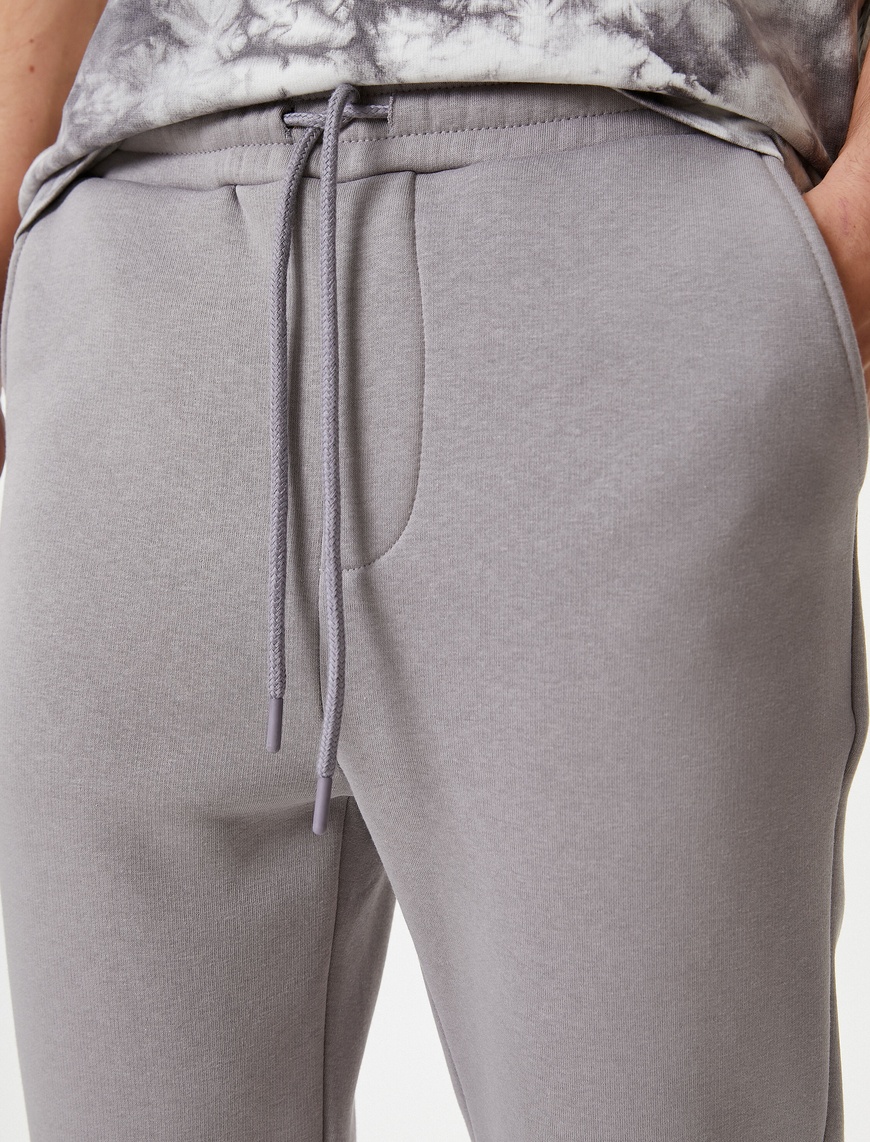   Jogger Eşofman Altı Slogan Baskılı Beli Bağcıklı Cepli Şardonlu