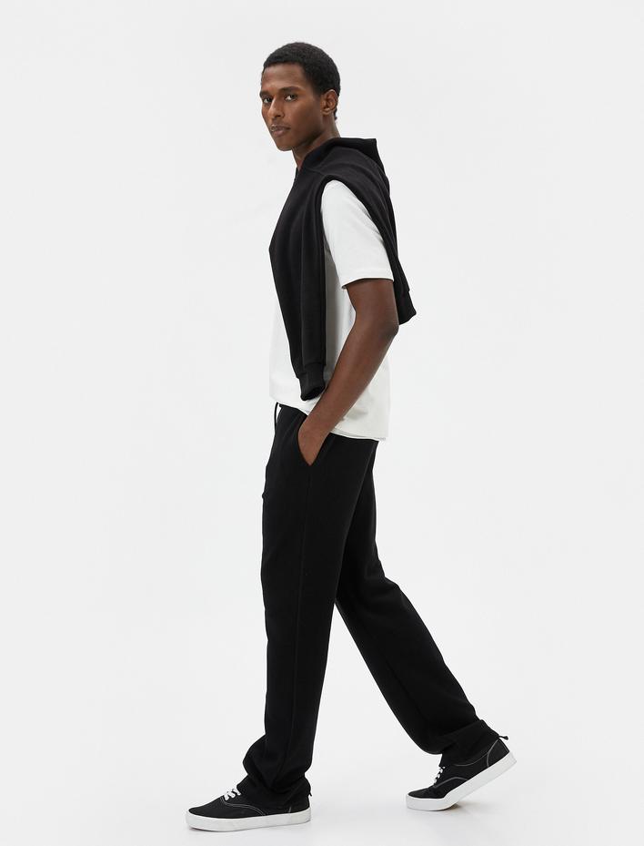  Oversize Eşofman Altı Beli Bağcıklı Bol Paça Cep Detaylı