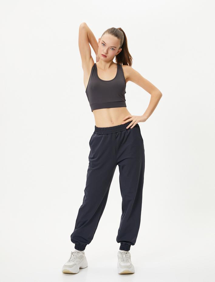  Sporcu Sütyeni Arkası Tül ve Cep Detaylı Slim Fit