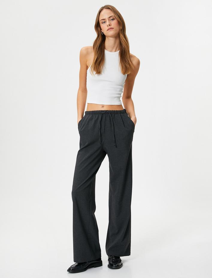  Bol Paça Pantolon Beli Bağcıklı Rahat Kesim Cep Detaylı