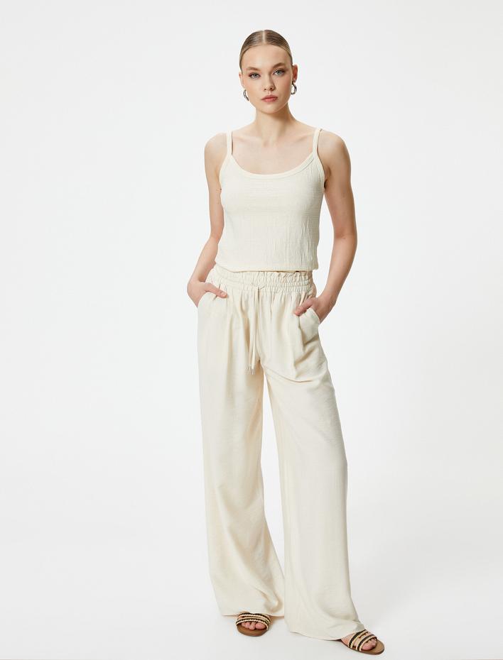  Bol Paça Pantolon Beli Bağcıklı Viskon Cepli Astarsız Yarı Transparan