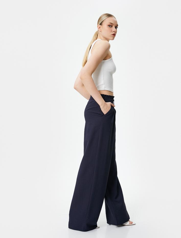  Bol Paça Pantolon Beli Bağcıklı Viskon Cepli Astarsız Yarı Transparan