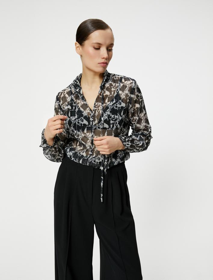  Uzun Kollu Transparan Fırfırlı Hakim Yaka Simli Bluz