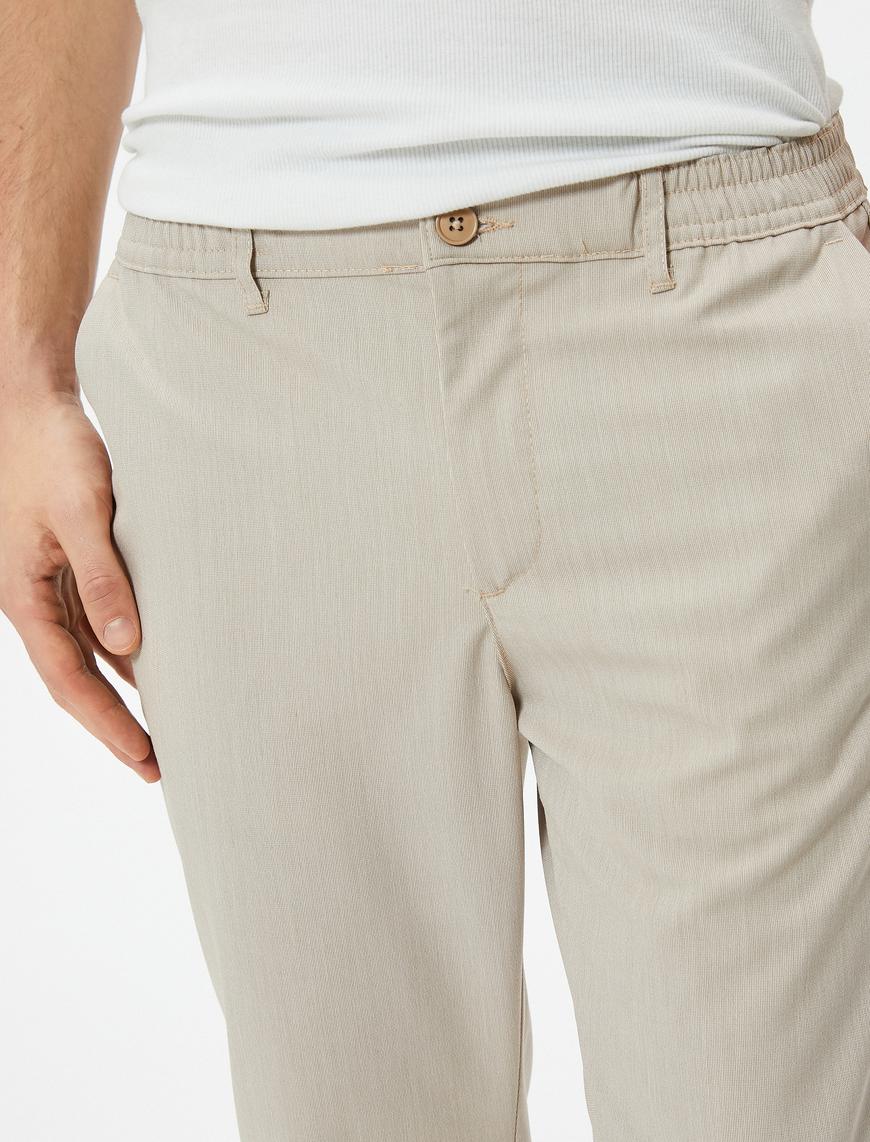   Slim Fit Pantolon Beli Lastikli Düğmeli Cep Detaylı Katlı Paça