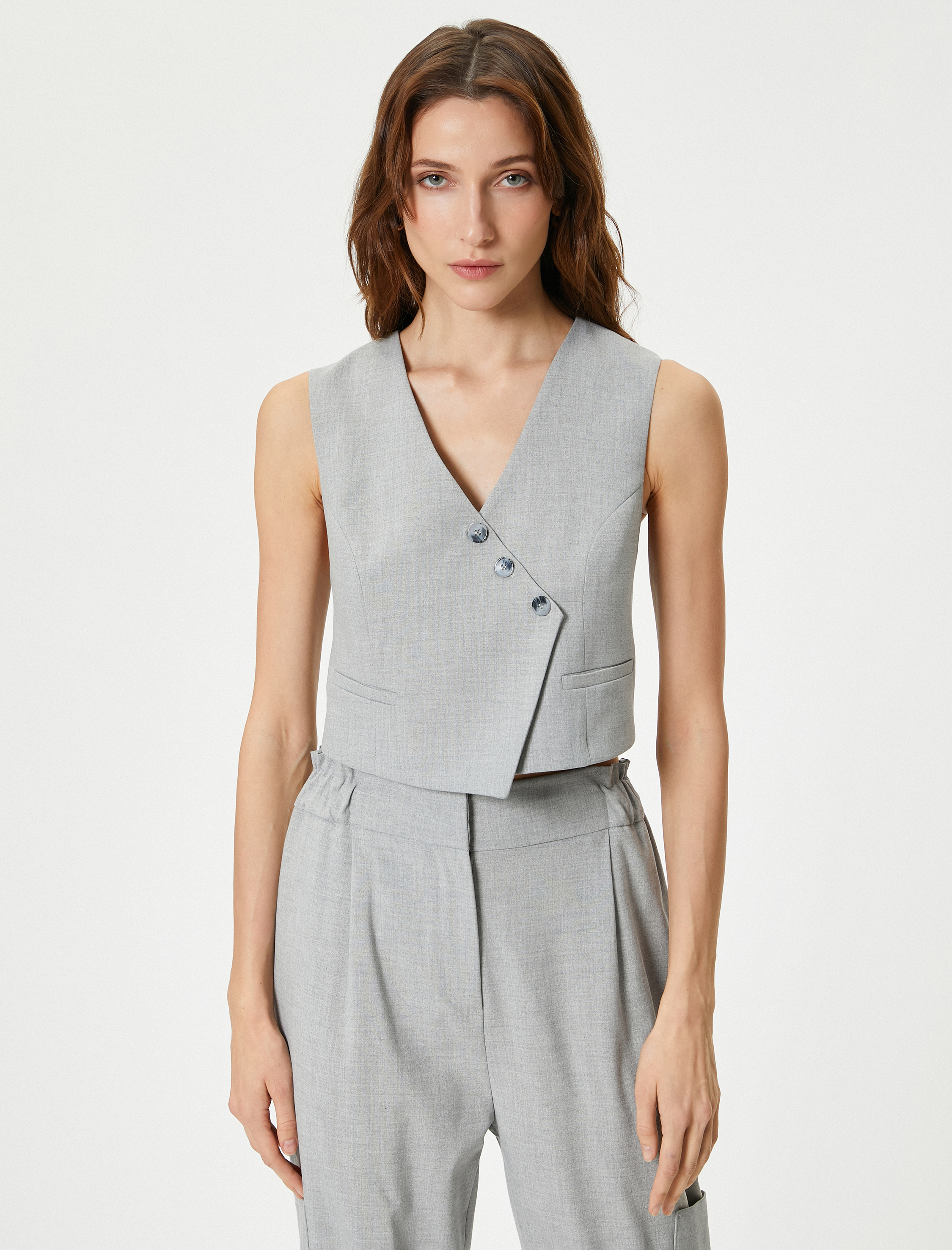   Kısa Yelek Asimetrik Kesim  V Yaka Düğmeli