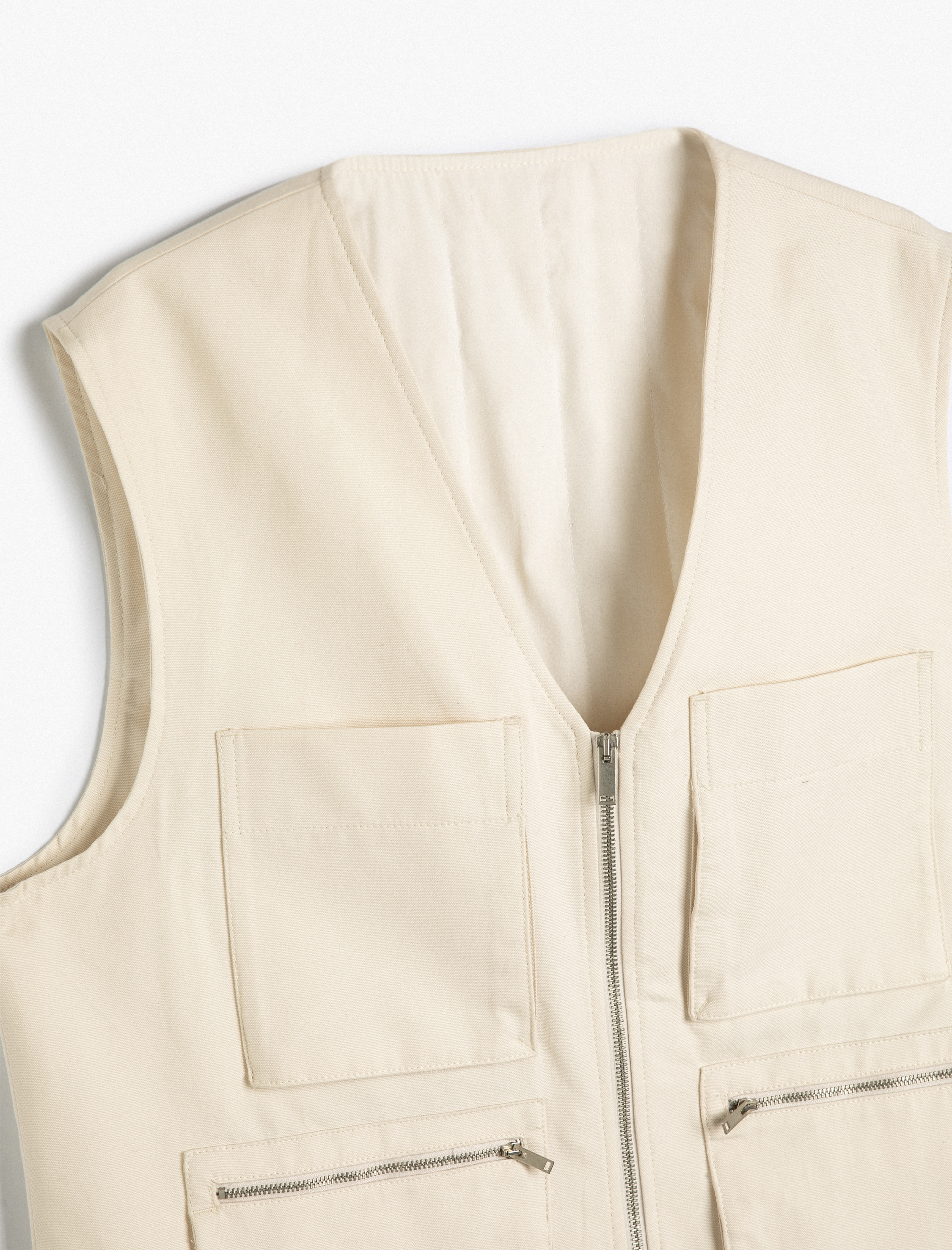   Kanvas Yelek Kolsuz V Yaka Fermuarlı Kapaklı Cep Detaylı