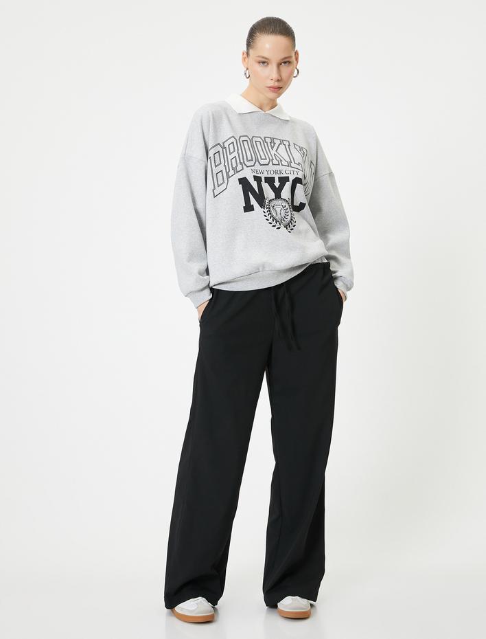  Şardonlu Oversize Polo Yaka Sweatshirt  Kolej Temalı Baskılı