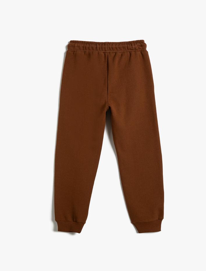 Erkek Çocuk Jogger Eşofman Altı Şardonlu Beli Bağlamalı Baskı Detaylı Pamuklu