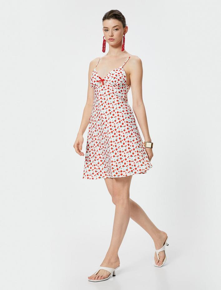  Koton X Sibil Çetinkaya - Kiraz Desenli Mini Viskon Elbise İnce Askılı Kalp Yaka Fiyonk Detaylı