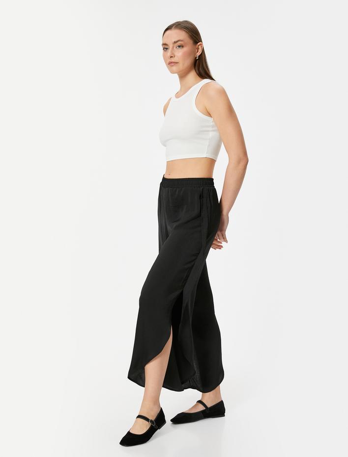  Asimetrik Yırtmaç Detaylı Pantolon Rahat Kalıp Aerobin Kumaş