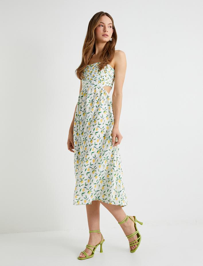  Koton X Sibil Çetinkaya - Midi Çiçekli Elbise Limon Baskılı Askılı Pencere Detaylı