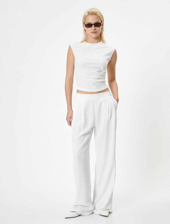  Koton X Melis Ağazat - Kolsuz Üst Yuvarlak Yaka Drape Detaylı Krep Scuba Kumaş