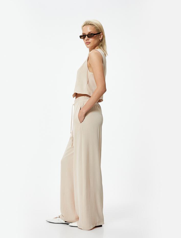  Dökümlü Palazzo Pantolon Beli Lastikli Bağlamalı Cepli