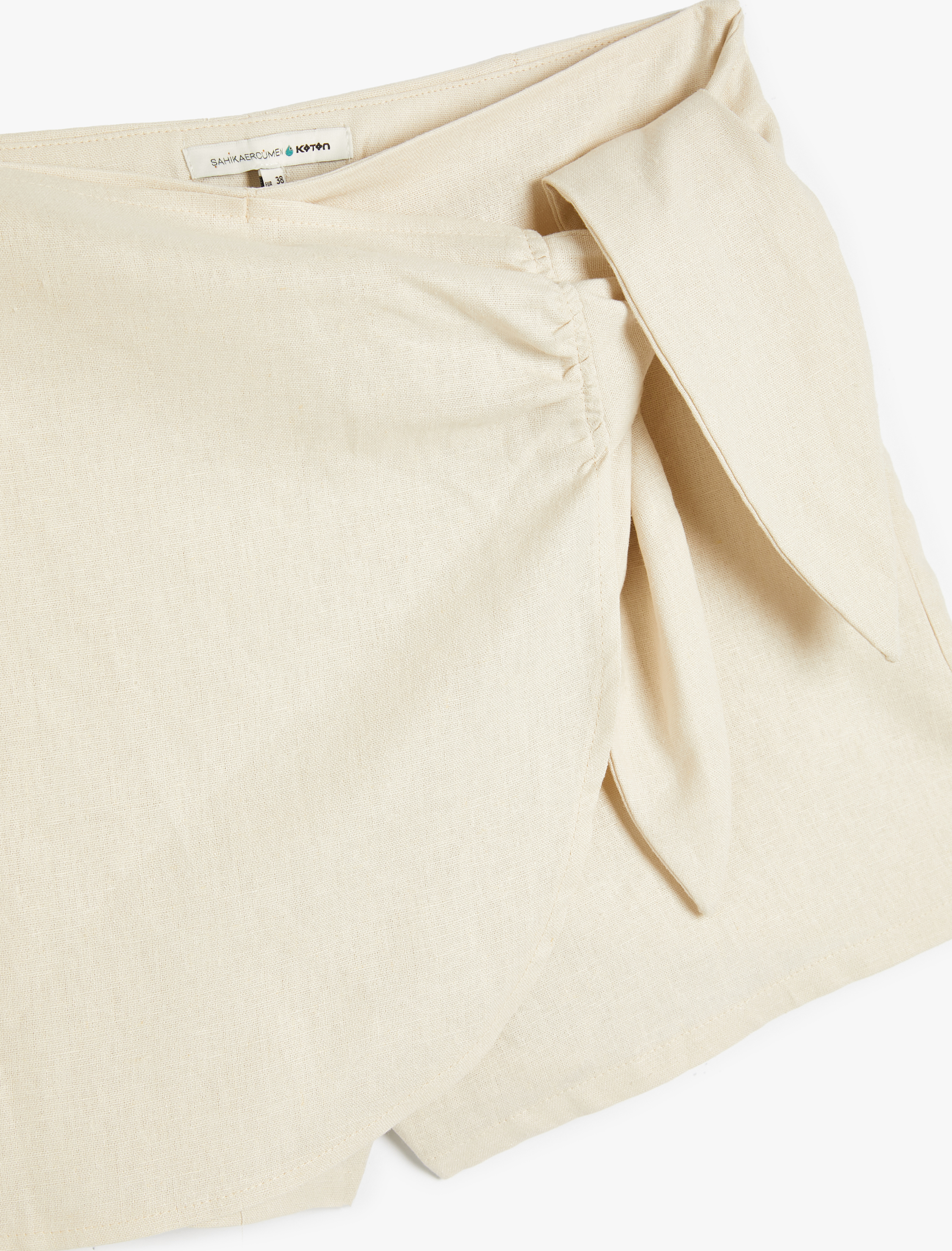   Koton X Şahika Ercümen - Mini Keten Şort Etek Kruvaze Bağlama Detaylı