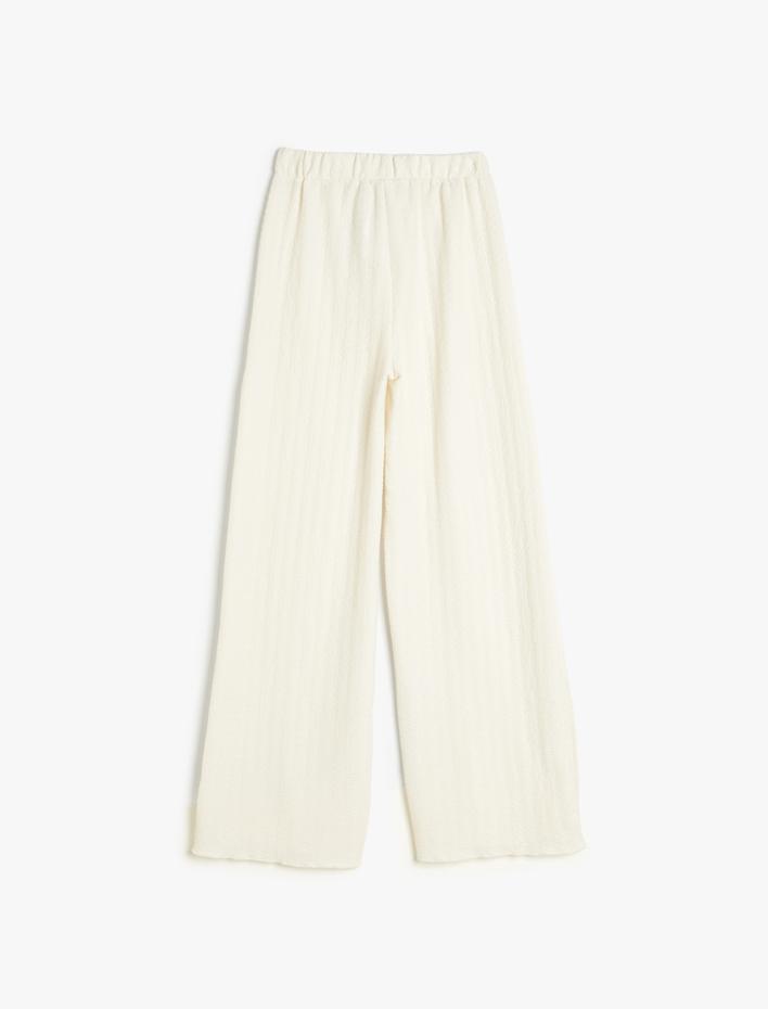 Kız Çocuk Bol Paça Pantolon Beli Lastikli Dokulu