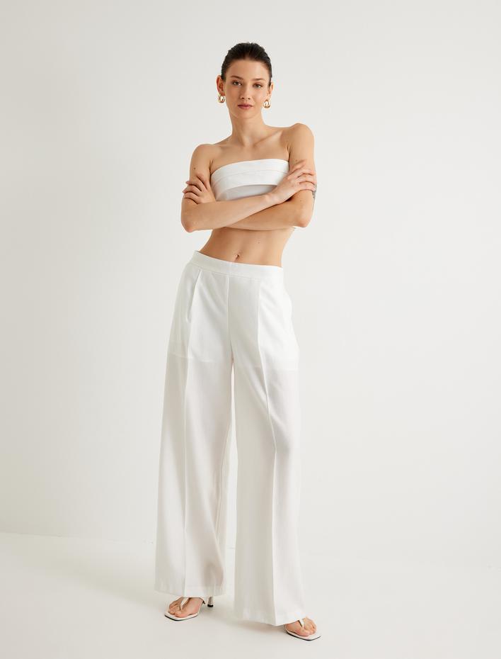  Koton X Melis Ağazat - Geniş Paça Pantolon Yarım Astarlı Pile Detaylı Cepli