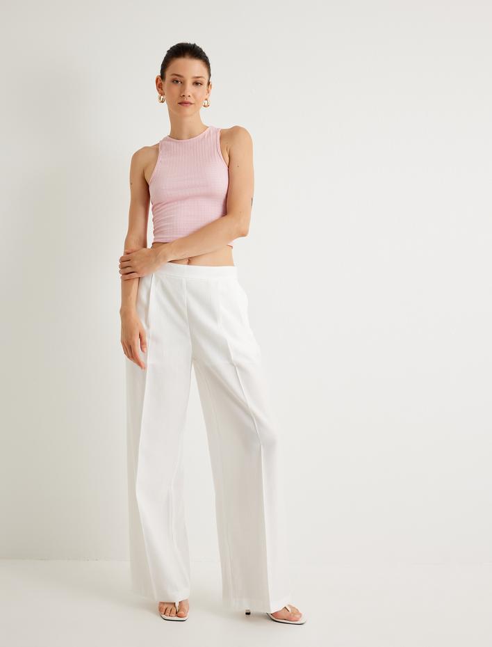  Koton X Melis Ağazat - Basic Halter Yaka Atlet Dokulu