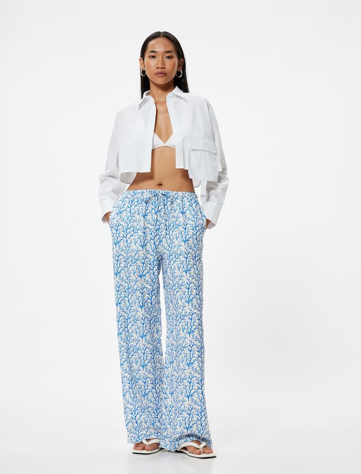  Bol Paça Pantolon Yüksek Bel Bağlama Detaylı Floral Desenli Rahat Kalıp