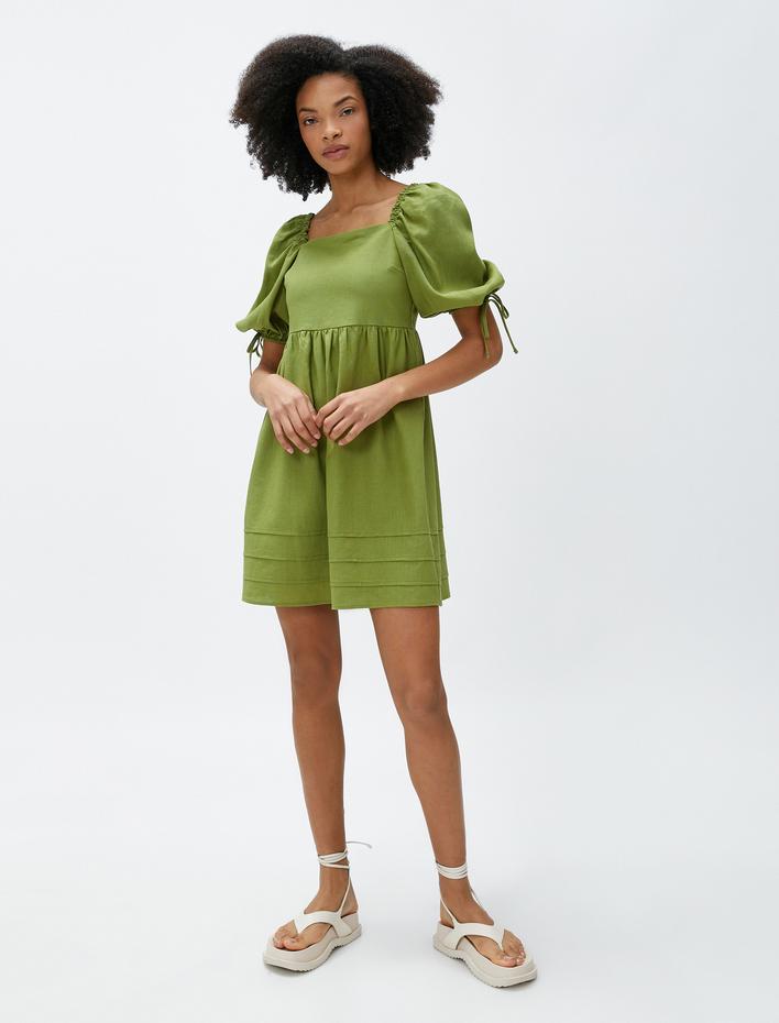  Mini Elbise Keten Karışımlı Balon Kollu Pencere Detaylı Fiyonk Detaylı