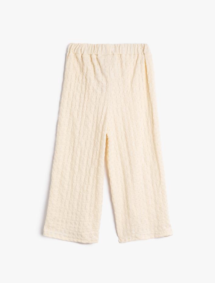 Kız Çocuk Palazzo Pantolon Paçaları Asimetrik Beli Lastikli Dokulu