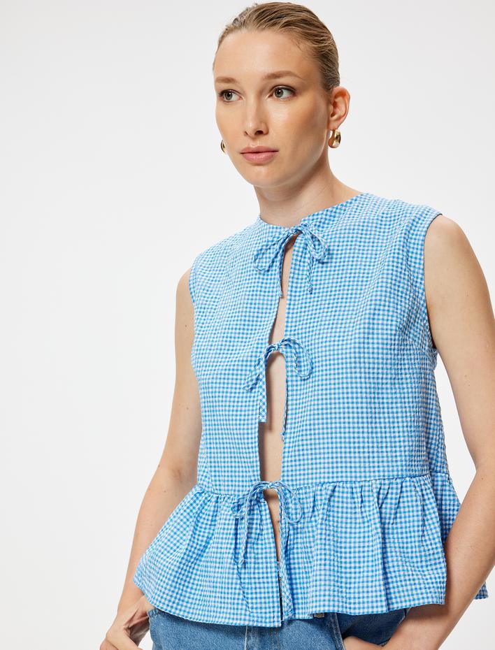  Fiyonk Detaylı Peplum Yelek Pötikareli