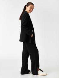 Paçası Yırtmaçlı Bol Paça Pantolon
