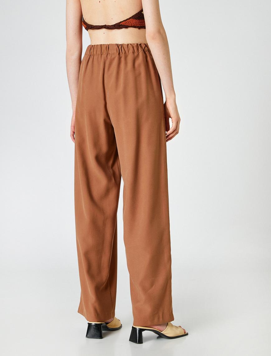   Belden Bağlamalı Geniş Paça Pantolon
